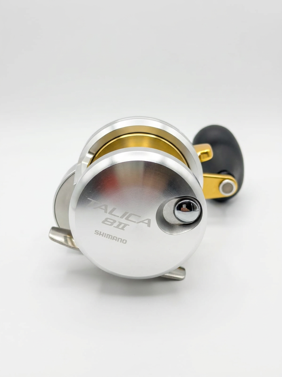 Carrete Shimano Talica 8II plateado con tambor dorado