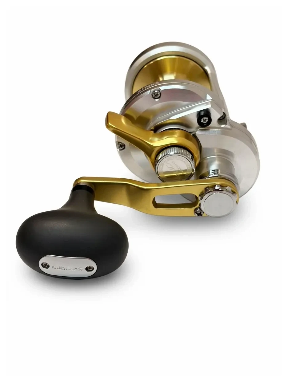 Carrete Shimano Talica 10 plateado con manivela dorada y perilla negra